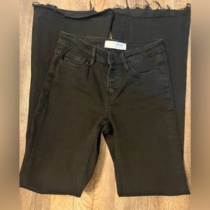 Black button fly mid rise flare. Size 26
